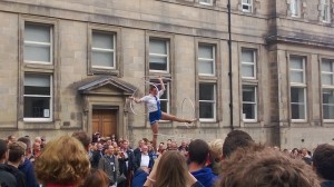 A circus performer on the Royal Mile during Ed Fringe.